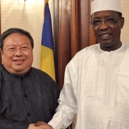 Patrick Ho led a CEFC Chinese Energy delegation to meet Chadian President Iris Deby in November 7, 2014. One month later in the second visit, Ho brought along eight boxes stuffed with cash. Photo: Handout