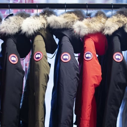 Parkas hang on display at a Canada Goose store in Montreal. Photo: Bloomberg