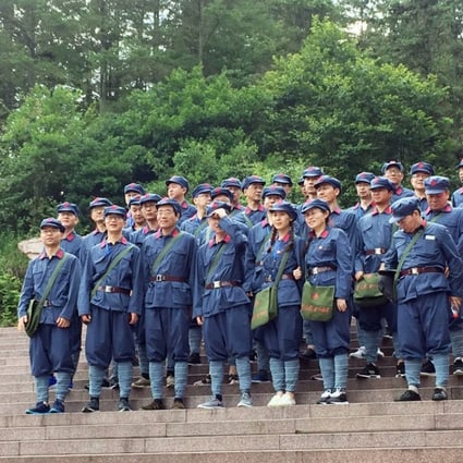 A group of visitors to the Jinggang mountains in Jiangxi province, considered the birthplace of the People’s Liberation Army on July 13, 2018. Many tours make it mandatory for visitors to dress up in Red Army uniforms. Photo: SCMP/ Josephine Ma