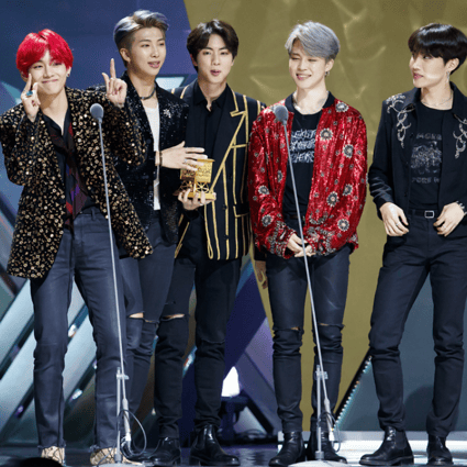 K-pop group BTS receive Album of the Year for their album Love Yourself Tear. Photo: Mnet Asian Music Awards