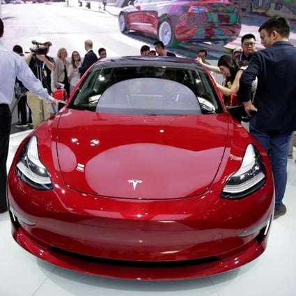 A Tesla Model 3 car is displayed during a media preview at the Auto China 2018 motor show in Beijing on April 25. Photo: Reuters