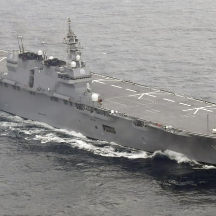 Japan’s plans to “enable fighter jets to be operated from existing warships” would involve refitting the destroyer Izumo to allow the carrying of F35B fighter bombers. Photo: Kyodo News via AP