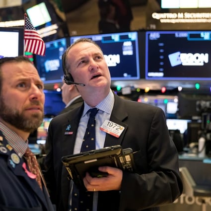 Traders work on the floor of the New York Stock Exchange on December 7. Photo: Bloomberg