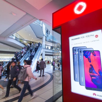 Advertising for the Huawei P20 Series of smartphones is seen at the Eaton Centre in Toronto, Canada, May 17, 2018. Photo: Xinhua