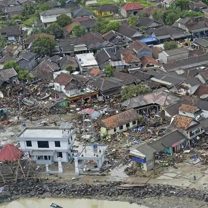 Demolished homes seen from a rescue helicopter after the tsunami hit Banten in Indonesia. Photo: EPA