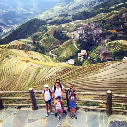 Cecile Pont and her children in Rice fields in Guilin, China.