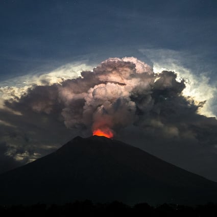 Mount Agung volcano spews hot volcanic ash in June. On Sunday it shot a burst of hot ash into the air. File photo: EPA