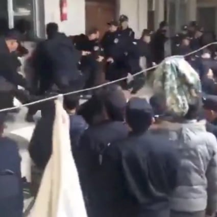 Video footage captured police officers harassing Hui Muslim worshippers after Chinese authorities ordered three mosques in Weishan country, Yunnan province, chained shut to await demolition. Photo: Handout