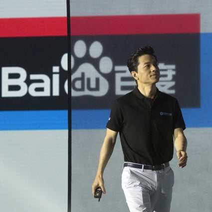 Robin Li, CEO of search giant Baidu, arrives for the Baidu Create 2018 held in Beijing, China, Wednesday, July 4, 2018. The event seeks to connect developers, businesses and individuals to the AI resources of the Chinese search company. (AP Photo/Ng Han Guan)