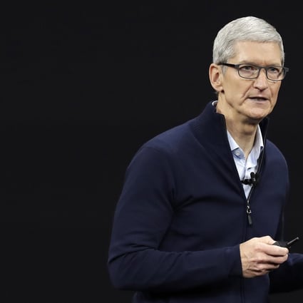 Apple CEO Tim Cook gives a presentation at the Steve Jobs Theatre on the Apple campus in Cupertino, California. Photo: AP