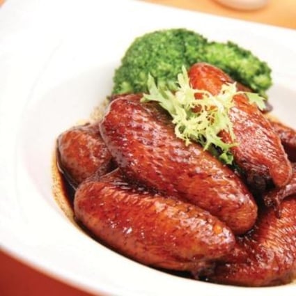 At Tai Ping Koon restaurant today, a plate of eight TPK-style chicken wings in Swiss sauce costs HK$185.