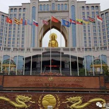 The giant golden Buddha at the Quanjian International Hotel in Jiangsu, China, has come under scrutiny as part of the public scandal rocking the health product company. Photo: Baidu.com