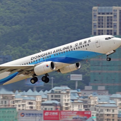 Shenzhen-based Donghai Airlines said a pilot let his wife, who was not named, into the cockpit on two flights on July 28. Photo: Handout