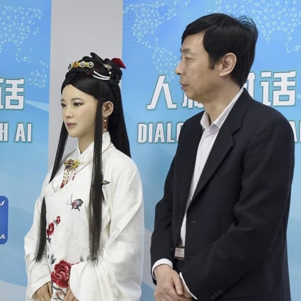 Lifelike humanoid Jia Jia (left), known as “Robot Goddess”, and her creator Professor Chen Xiaoping, who is leading development of ethical guidelines for artificial intelligence in China. Photo: Xinhua