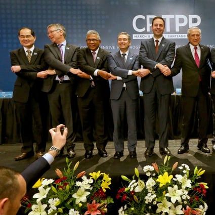 Ministers pose for a pictures after the signing ceremony of the Comprehensive and Progressive Agreement for Trans-Pacific Partnership, CPTPP, in Santiago, Chile. Photo: Associated Press