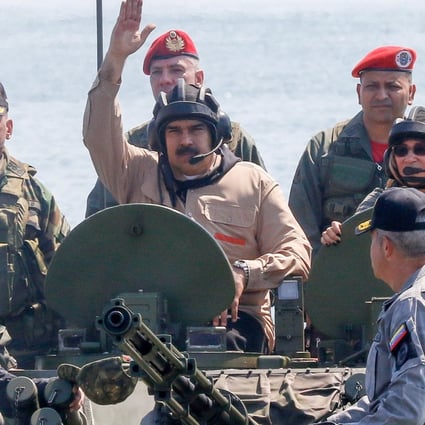 President Nicolas Maduro rides in an amphibious vehicle in Puerto Cabello, Venezuela. Photo: Reuters