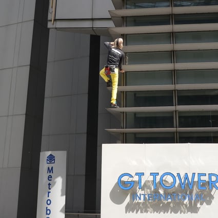 French Spider-Man' Alain Robert arrested after scaling 47-storey skyscraper  in Manila | South China Morning Post