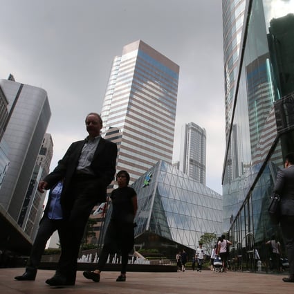 Hong Kong did better than mainland China when it comes to salaries in banking and financial services, its mainstay industry. But Singapore leads Asia in the sector. Photo: K. Y. Cheng