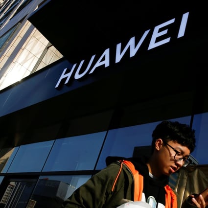 A man walks past a Huawei shop in Beijing, China. Photo: Reuters
