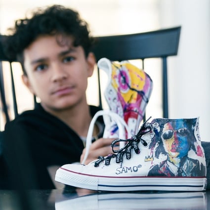 Canadian art prodigy Evan Sharma with sneakers designed for his label RBLB.