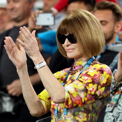 Anna Wintour applauds after Serena Williams’ match against Simona Halep at the Australian Open, in Melbourne. Picture: Reuters