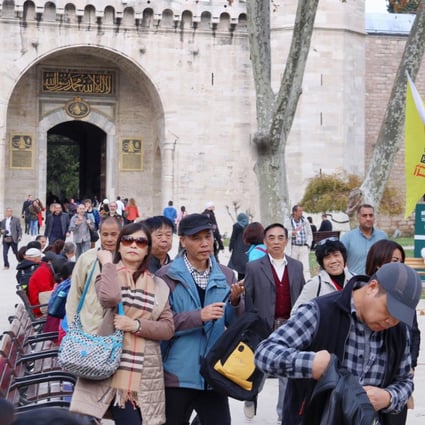 Chinese tourists at the Topkapi Palace in Istanbul. Photo: Kyodo