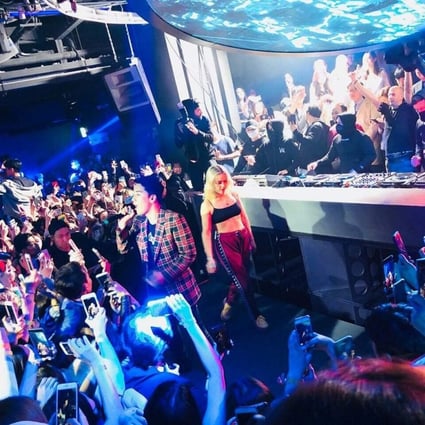 Seungri from BigBang assists in the management of Burning Sun nightclub. Here he is performing in 2018.