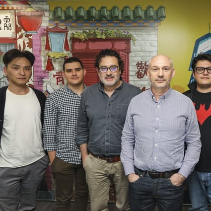 Dennis Wong (infographic designer), Pablo Robles (infographic designer), Adolfo Arranz (deputy head, graphics and illustration), Darren Long (head of graphics and magazine design), Marco Hernandez (digital design director), and Marcelo Duhalde (infographic designer) at the Post’s office in Causeway Bay. Photo: Roy Issa
