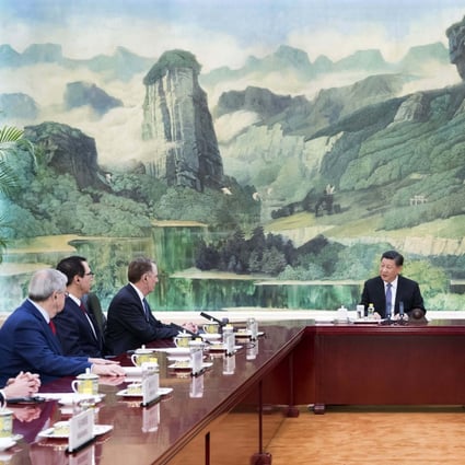 Chinese President Xi Jinping (centre) meets the trade negotiators in Beijing on Friday. Photo: Xinhua