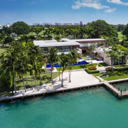 The estate has a 100-foot pool and a beach with pink sand imported from the Bahamas. Photos: The Alexander Team of Douglas Elliman Real Estate