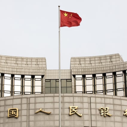 Banks granted 3.23 trillion yuan (US$477 billion) in new loans in January, while total social financing reached a record 4.64 trillion yuan (US$685 billion), an amount equal to 5 per cent of China’s gross domestic output last year. Photo: Bloomberg
