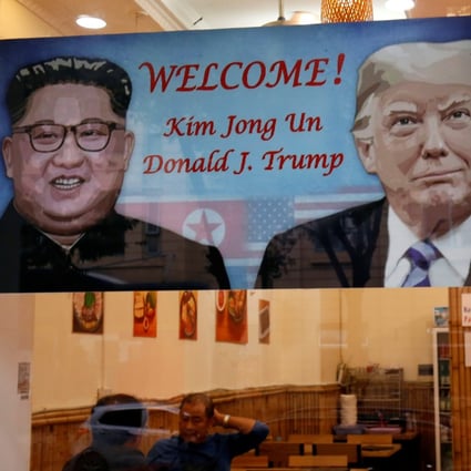 A welcoming banner for US President Donald Trump and North Korean leader Kim Jong-un. Photo: Reuters