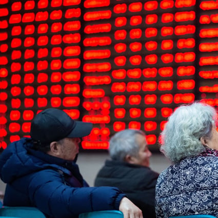 Investors check out prices at a stock trading hall in Nanjing, east China's Jiangsu Province, on February 25, 2019. Photo: Xinhua