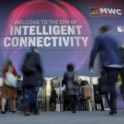 Attendees enter the Fira Gran Via complex where the four-day MWC Barcelona, the world’s largest exhibition for the mobile industry, is held annually in Spain. Photo: Bloomberg