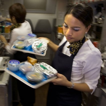 Which airlines provide the best food and which serve the worst? Airline reviewer Nik Loukas compares in-flight meals. Photo: Alamy