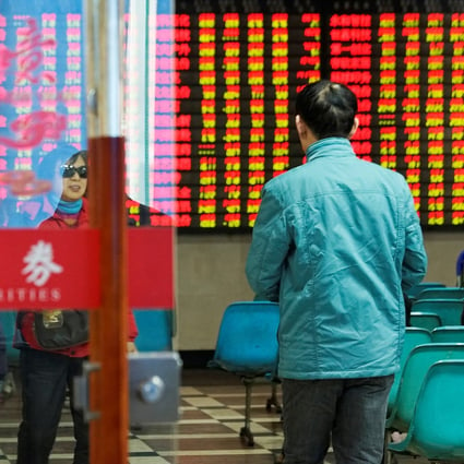 A man at the trading hall of Nanjing Securities in Nanjing on January 21, 2019. Photo: REUTERS