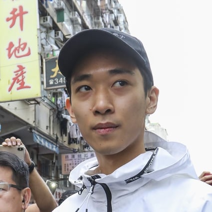 Wong Ching-kit is suspected of being behind a stunt that saw banknotes being thrown from the top of a building in Sham Shui Po in December. Photo: Dickson Lee