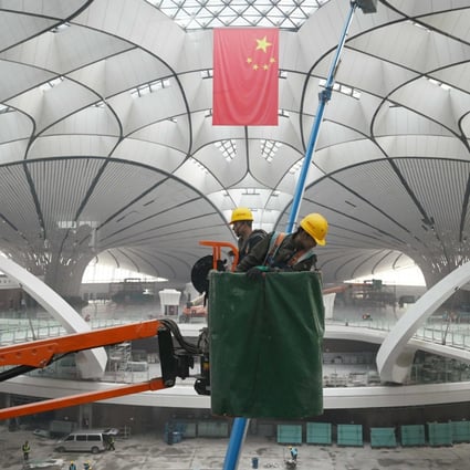 Construction work at Beijing airport: a symbol of the country’s economic resilience. Photo: AFP