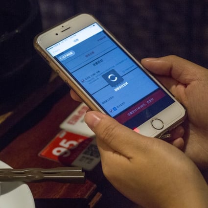 At a restaurant in Sun Plaza, Shenzhen, China, a customer pay the bill through mobile payment platforms. 2017. Photo: SCMP