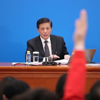 NPC spokesman Zhang Yesui said there would be no change in how investments from Hong Kong, Macau and Taiwan are treated. Photo: Xinhua
