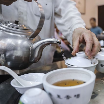A Chinese restaurant serves traditional tea in Hong Kong. Blockchain Group is a maker of and seller of teas, not a company specialising in the technology that underpins cryptocurrencies. Photo: Winson Wong