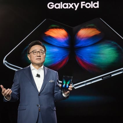 Koh Dong-Jin, the president and chief executive of Samsung Electronics’ information technology and mobile communications division, unveils the company’s Galaxy Fold smartphone at an event in San Francisco, California, on February 20, 2019. Photo: Handout