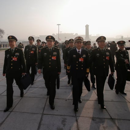 Military delegates arrive at the Great Hall of the People for the National People’s Congress on Tuesday. Photo: Reuters