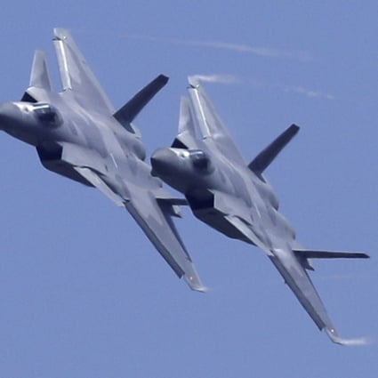Two J-20 stealth fighter jets of the Chinese People's Liberation Army. Given the slowing Chinese economy and the trade war with the US, the defence budget of 1.18 trillion yuan (US$176 billion) is modest and realistic. Photo: AP