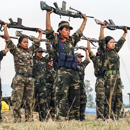 Maoist rebel women soldiers perform a drill in Jhapa district, about 575km east of Kathmandu, Nepal, in November 2006. Some countries remain haunted by their Maoist pasts. Picture: AFP