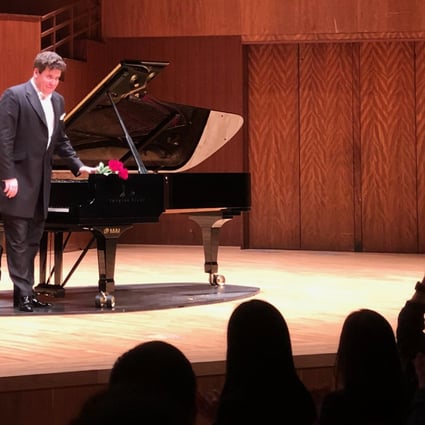 Denis Matsuev receives applause during his recital of Tchaikovsky piano music at the Hong Kong City Hall Concert Hall as part of the 2019 Hong Kong Arts Festival. Photo: courtesy Hong Kong Arts Festival