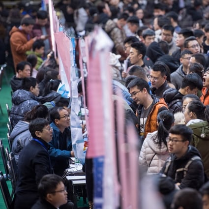 Over 10,000 students from Taiyuan University of Technology, including those who will graduate in 2019 and who graduated in the previous years, look for job opportunities at a job fair held on campus in Taiyuan city, capital city of China’s Shanxi province, on November 17, 2018. Photo: Imaginechina