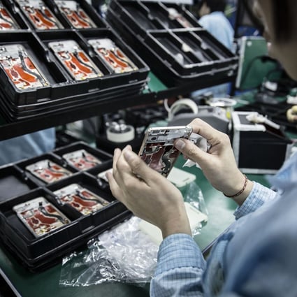 A OnePlus handset being assembled in Dongguan, China in 2015. (Picture: Bloomberg)