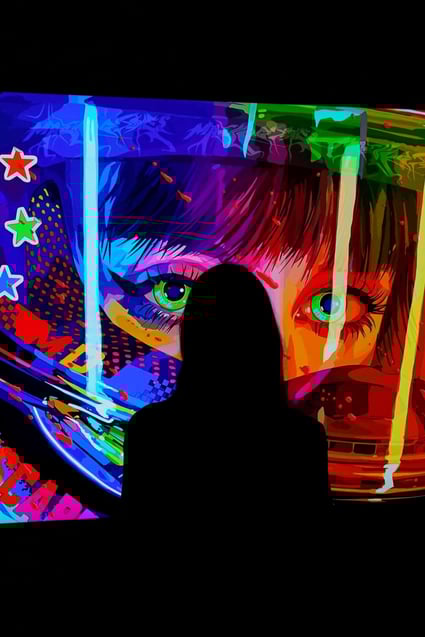 A woman looks at an NFT by Mad Dog Jones titled “SHIFT//“ at the Natively Digital: A Curated NFT Sale Online Auction hosted by Sotheby’s, on June 4, 2021. Photo: AFP