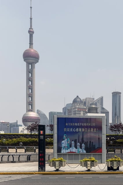 A screen displays a thank you message for healthcare workers in Shanghai’s Bund. Photo: Bloomberg